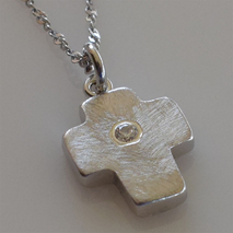 Handmade sterling silver cross 925o with silver chain and cord with mat silver plating and zirconia IJ-090054A Image 3 in natural environment without special lighting