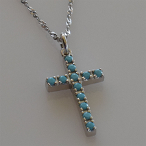 Handmade sterling silver cross 925o with silver chain and cord with silver plating and turquoise IJ-090058A Image 3 in natural environment without special lighting